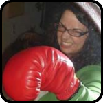 Woman Punching Mirror With Boxing Gloves Woman Punching Mirror With Boxing Gloves